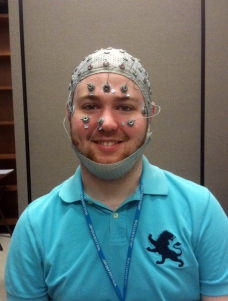 Joel is wearing an EEG cap.